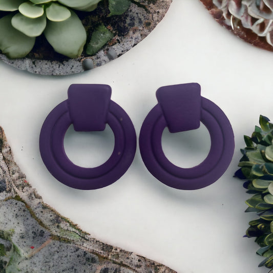 Purple statement studs